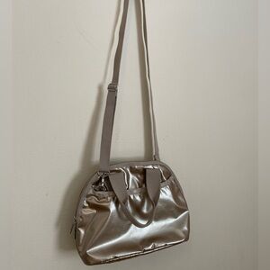 Beautiful, unique silver, iridescent LeSportsac top handle, convertible bag